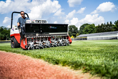 Ventrac Aera-Vator aerating athletic field